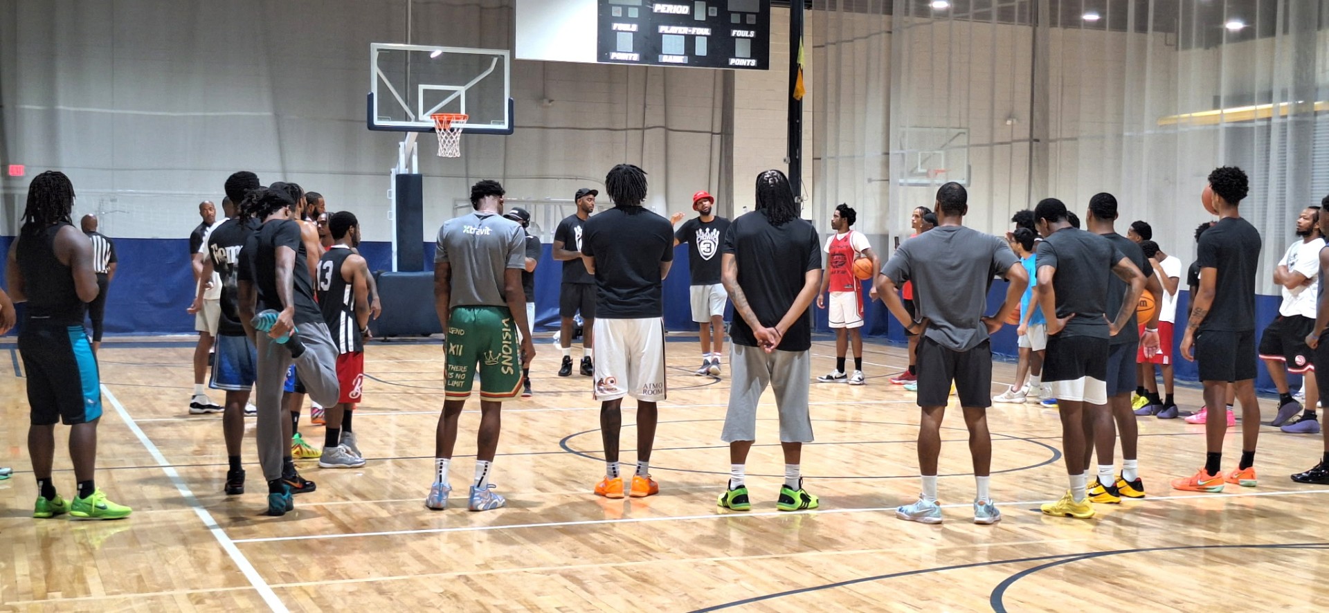 Players circle up at center court